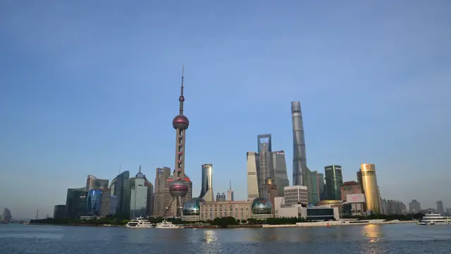 The Pudong financial district skyline in Shanghai, seen across the Huangpu River.