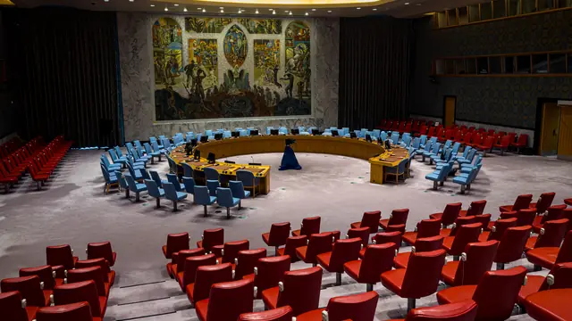 The United Nations Security Council chamber in New York, seen from the side of the horseshoe table.